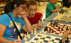 Children playing chess at Chess Camp