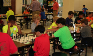 Chess tournament players competing